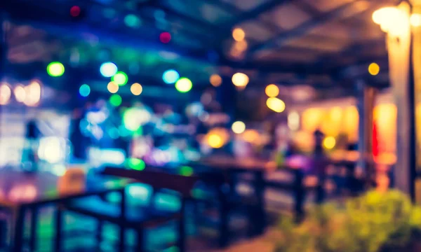 背景使用のための夜の時間にブラーレストランのイメージ ヴィンテージトーン — ストック写真