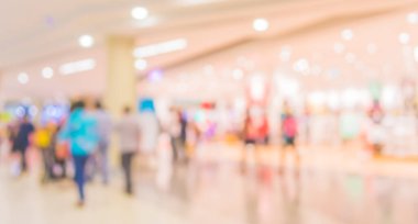 Alışveriş merkezinin bulanık görüntüsü ve arka plan kullanımı için insanlar .