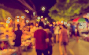 Arka plan kullanımı için Bokeh ile gece pazarının klasik ton bulanık görüntüsü.