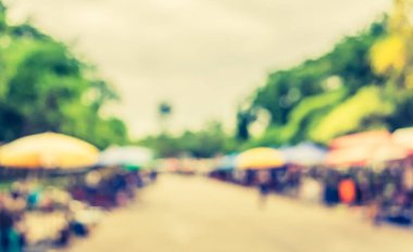 Arka plan kullanımı için günlük piyasanın soyut bulanık görüntüsü. (Klasik ton))