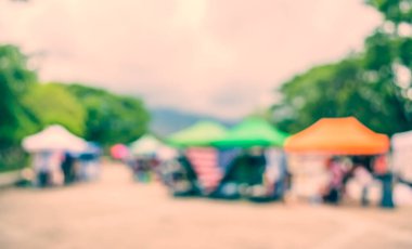 Arka plan kullanımı için günlük piyasanın soyut bulanık görüntüsü. (Klasik ton))