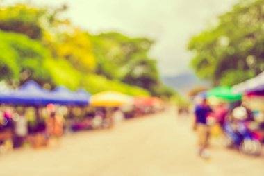 Arka plan kullanımı için günlük piyasanın soyut bulanık görüntüsü. (Klasik ton))