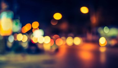 Arka plan kullanımı için sokak gecesi Bokeh 'inin klasik ton soyut bulanık görüntüsü .