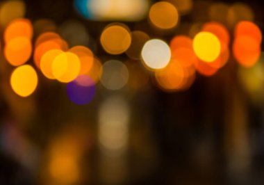 Sıcak renkli ışıklarla bulanık bokeh arkaplan resmi .