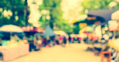 Arka plan kullanımı için günlük piyasanın soyut bulanık görüntüsü. (Klasik ton))