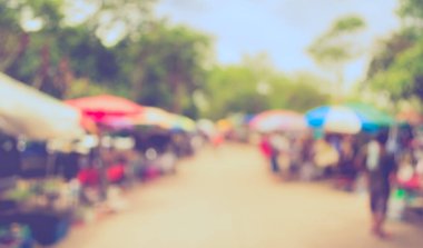 Arka plan kullanımı için günlük piyasanın soyut bulanık görüntüsü. (Klasik ton))