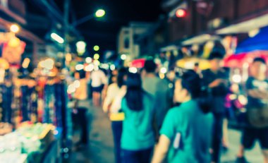 Arka plan kullanımı için Bokeh ile gece pazarının klasik ton bulanık görüntüsü.