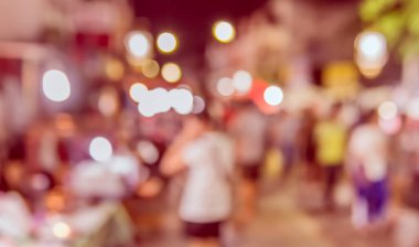 Arka plan kullanımı için Bokeh ile gece pazarının klasik ton bulanık görüntüsü.