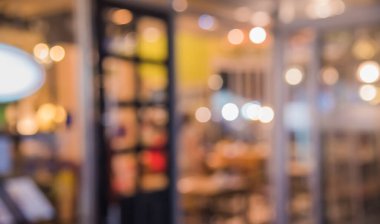 Arka plan kullanımı için Bokeh 'in olduğu bulanık restoran ya da gece vakti kahve dükkanının görüntüsü. (Klasik ton))