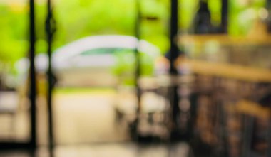 Arka plan kullanımı için Bokeh 'li bulanık kahve ve fırın görüntüsü. (Klasik ton))