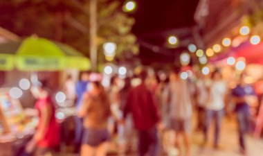 Arka plan kullanımı için Bokeh ile gece pazarının klasik ton bulanık görüntüsü .