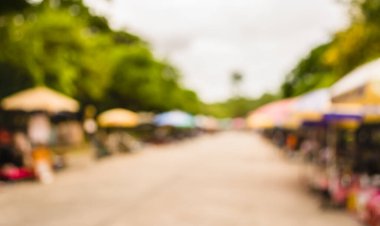 Arka plan kullanımı için günlük piyasanın soyut bulanık görüntüsü. (Klasik ton))