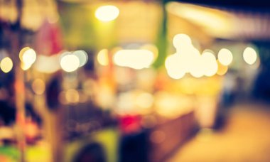 Arka plan kullanımı için Bokeh ile sokakta bulanık gece pazarının klasik ton görüntüsü .