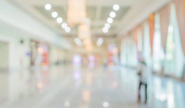 Alışveriş merkezinin bulanık görüntüsü ve arka plan kullanımı için insanlar