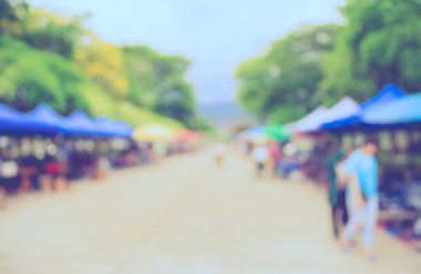 Arka plan kullanımı için günlük piyasanın soyut bulanık görüntüsü. (Klasik ton))