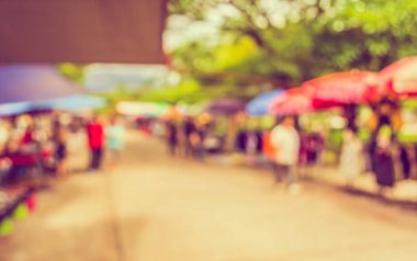 Arka plan kullanımı için günlük piyasanın soyut bulanık görüntüsü. (Klasik ton))