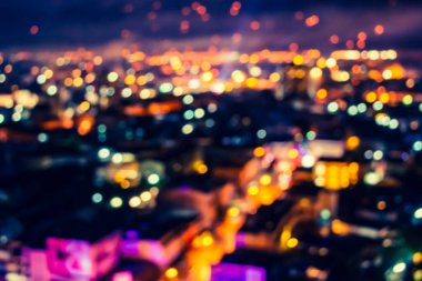 Yılbaşı festivali sırasında Bokeh 'in arka plan kullanımı için kullandığı şehir ışıklarının klasik ton bulanık görüntüsü.