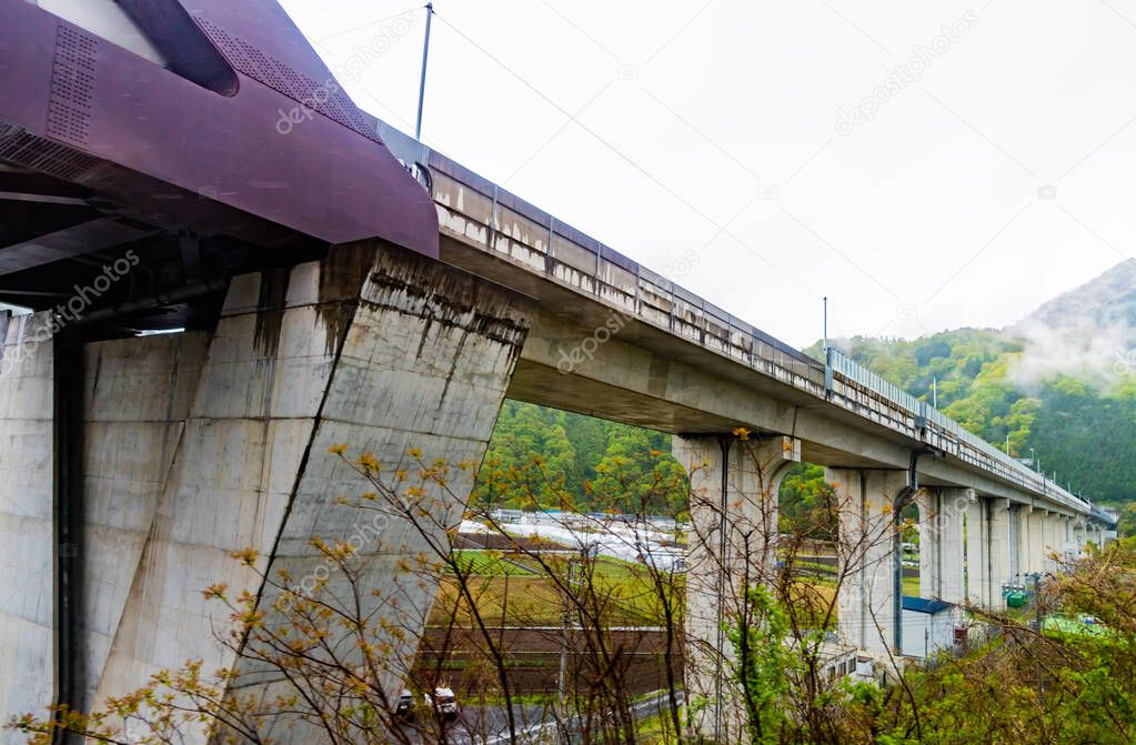 vintage tone image of modern cement bridge in japan residence area in otsuki , Yamanashi Prefecture Japan.
