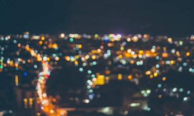 Soyut şehir bokeh ışık arkaplanının klasik ton bulanık görüntüsü