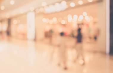 Alış veriş merkezinin ve insanların arka plan kullanımı için bulanık tonu .