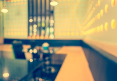 Arka plan kullanımı için Bokeh ile kahve dükkanının klasik ton bulanık görüntüsü .