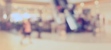 Alış veriş merkezinin ve insanların arka plan kullanımı için bulanık tonu .