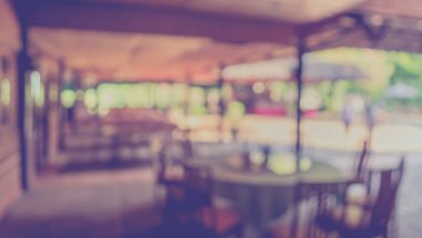 Arka plan kullanımı için Bokeh ile birlikte restoranın klasik ton bulanık görüntüsü .