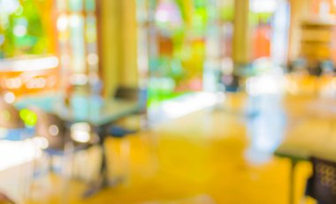 Arka plan kullanımı için Bokeh ile gündüz vakti kahve dükkanının bulanık görüntüsü .