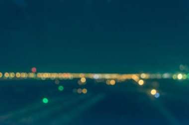 Arka plan kullanımı için Bokeh ile gece vakti pist görüntüsünün klasik ton bulanıklığı.