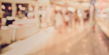 Alış veriş merkezinin ve insanların arka plan kullanımı için bulanık tonu .