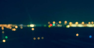 Arka plan kullanımı için Bokeh ile gece vakti pist görüntüsünün klasik ton bulanıklığı.