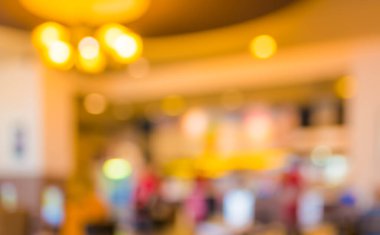 Bokeh imajı olan bir kafenin arka planı bulanık .