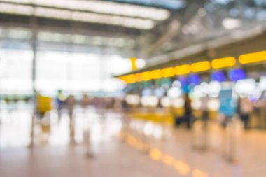 Arka plan kullanımı için giriş yapan yolcular için havaalanı sayacının bulanık görüntüsü.