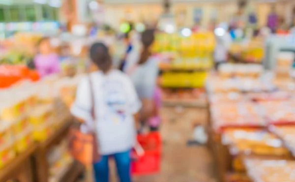 image of blur people shopping at bakery shop for background usage .