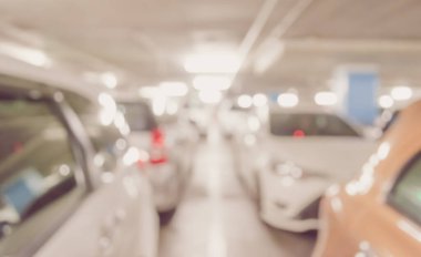 Arka plan kullanımı için Otomobil Parkı Bokeh ile klasik ton bulanıklığı görüntüsü.