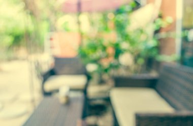 Arka plan kullanımı için Bokeh ile kahve dükkanının klasik ton bulanık görüntüsü .