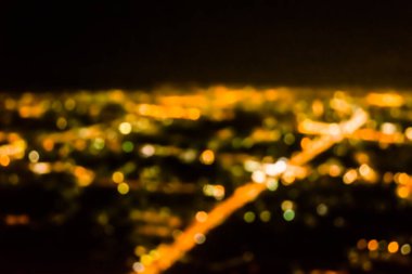 Soyut şehir bokeh ışık arkaplanının klasik ton bulanık görüntüsü