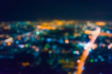 Soyut şehir bokeh ışık arkaplanının klasik ton bulanık görüntüsü