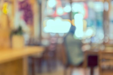 Arka plan kullanımı için Bokeh ile kahve dükkanının klasik ton bulanık görüntüsü .