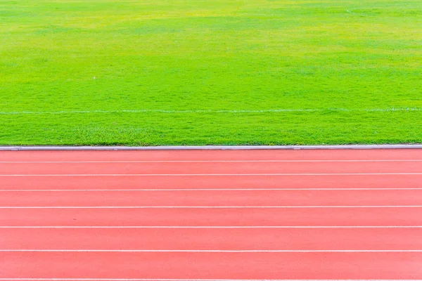 image of athletics track lane made with orange rubber for background texture.