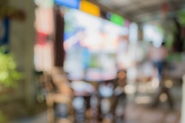 Arka plan kullanımı için Bokeh ile kahve dükkanının klasik ton bulanık görüntüsü .