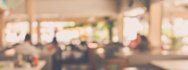 Kafenin arka planında Bokeh imajı var. (Klasik ton))