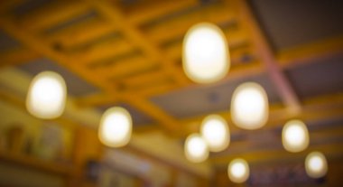 Arkadaki kullanım için Bokeh ile Kafe ışığının bulanık görüntüsü .