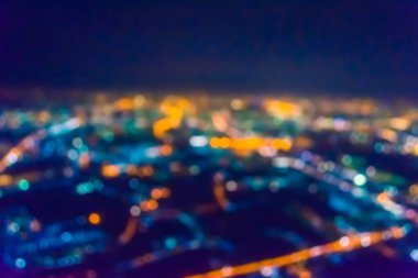 Soyut şehir bokeh ışık arkaplanının klasik ton bulanık görüntüsü