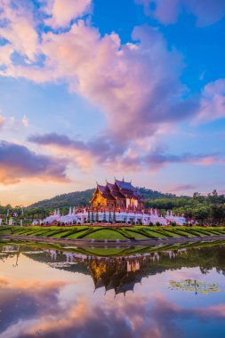 Ho kham luang (Royal Pavilion) northern Thai style building in Royal Flora International Horticulture Exposition(Ratchaphreuk)in Chiang Mai,Thailand on twilight time.(vertical)