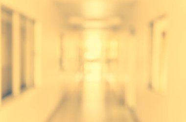 image of blur empty corridor with window and bokeh for background usage.