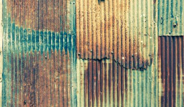 Close up shot vintage tone image of rusty wall background image .