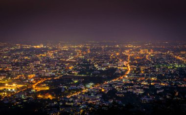 long exposure shot panorama image of Chiang Mai province,Thailand the old city  view from high angle spot night time.