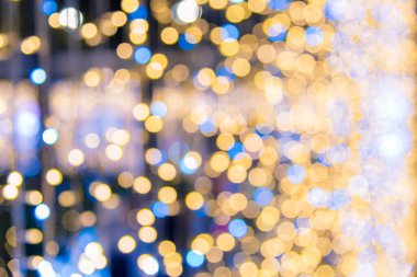 Sıcak renkli ışıklarla bulanık bokeh arkaplan görüntüsü. (Klasik ton))