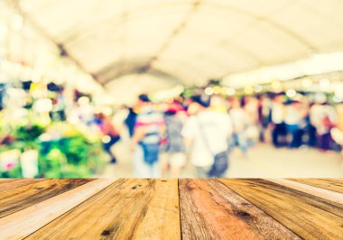 Vintage tone abstract blur image of  Street Day Market in garden with bokeh for background usage.